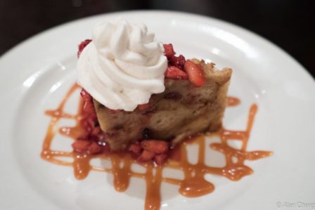 An incredible warm fig and cranberry bread pudding is topped with Tahitian vanilla gelato. 