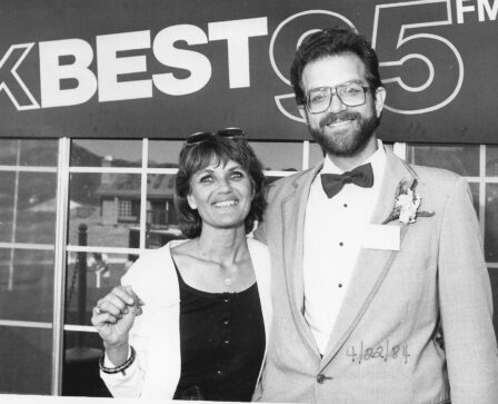 Laura Walcher and Mark DeBoskey stand in front of the radio station back in 1984.