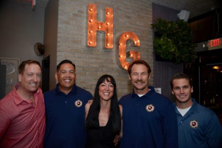 John Ealy, Owner of Harley Gray Kitchen and Bar and Red Hot Heroes’ host, with BID President Krista Lombardi and Fire Station 8 Captains Eric Nelson and Paul Moscoso