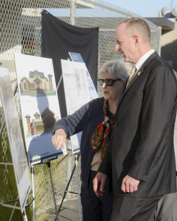 Nancy Carter discusses a rendering of the Library project with San Diego Library Foundation Chief Executive Officer Jay Hill. 