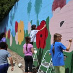 Volunteers Refresh Mission Hills Landmark Mural